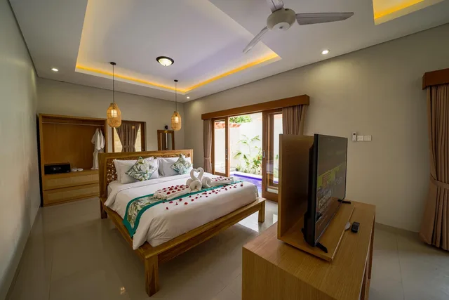 غرفة بغرفة نوم واحدة بمسبح خاص بجاكوزي، Three Brothers Bungalows & Villas Legian 1/1