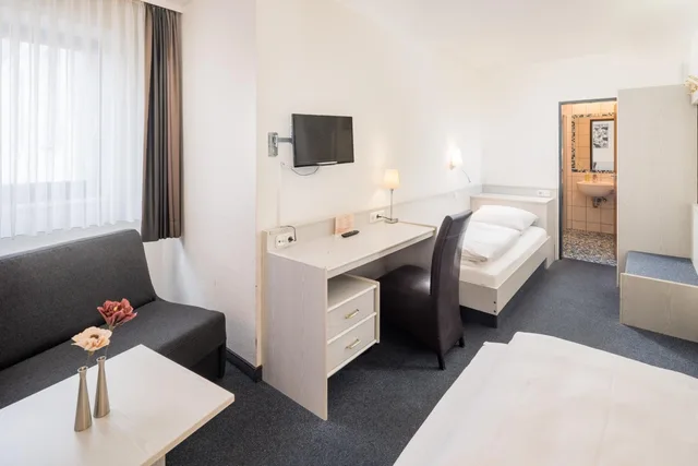 غرفة ثلاثية بسرير فردي، Hotel Rennschuh 3/8