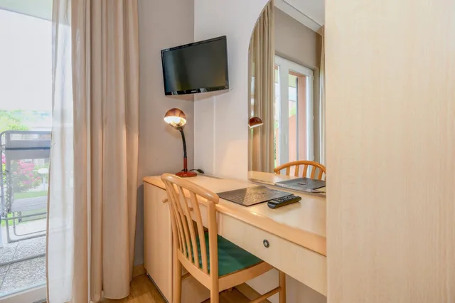 غرفة قياسية بسرير مزدوج بإطلالة على الحديقة مع سرير إضافي، Hotel Du Lac 7/7