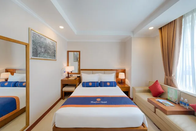 غرفة ديلوكس بسرير كينج بإطلالة جزئية على البحر، BlueSun Danang Beach Hotel 9/10