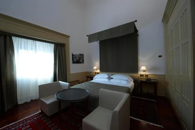 جناح ديلوكس بسرير كوين، Grand Hotel Piazza Borsa 1/2