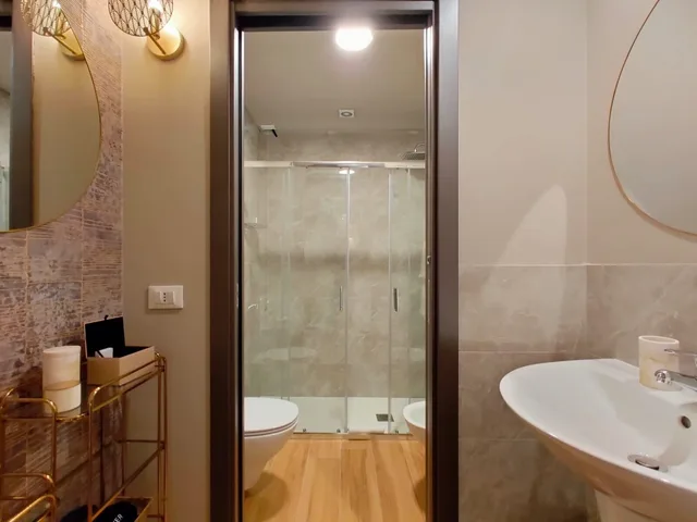 جناح ديلوكس بسرير كوين وسرير فردي، Intomilan Aparthotel Galleria Duomo 3/3
