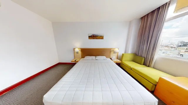 غرفة ديلوكس تنفيذية بسرير كوين وسرير فردي، Liberty Saigon Parkview Hotel 1/1