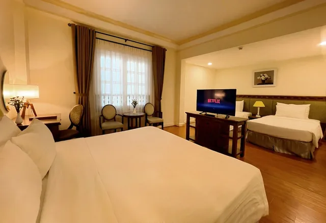غرفة سوبيريور رباعية بسرير كوين وسريرين منفصلين، Phoenix Hotel Vung Tau 1/10