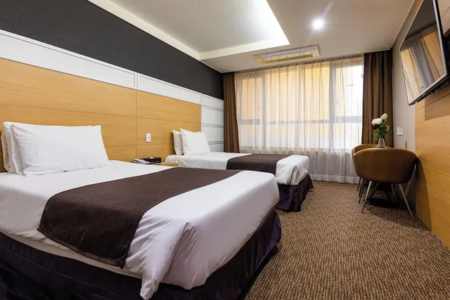 غرفة قياسية بسريرين منفصلين، Eastern Hotel Jeju 1/3