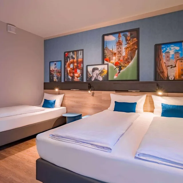غرفة ديلوكس ثلاثية بسرير فردي وثلاثة أسرّة، Ramada Encore by Wyndham Munich Messe 6/10