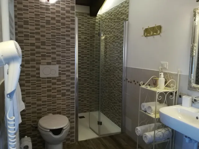 غرفة عائلية بسرير مزدوج، Villa ai Tigli 8/9