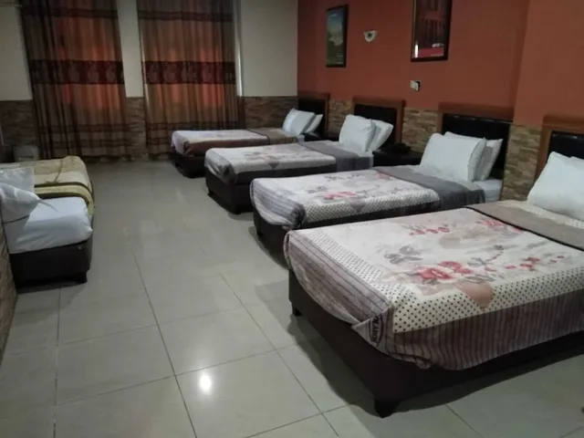 غرفة قياسية رباعية بأربعة أسرّة، Amman Palace Hotel 1/2
