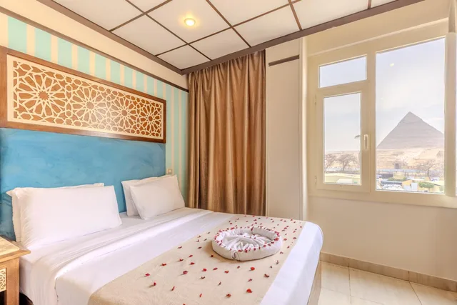 غرفة رباعية بسريرين كوين بشرفة، Great Pyramid Inn 4/4