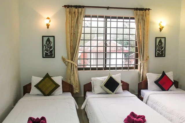 Room, Triple, 3 Beds, with Fan، Tropical Breeze Guesthouse 1/1
