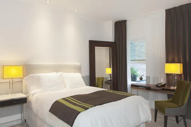 Retreat, Deluxe, Queen Bed، The Broome 1/2