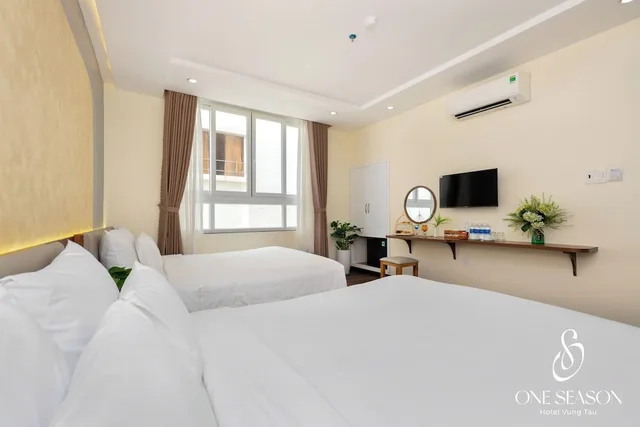 غرفة غراند رباعية بسريرين كوين بإطلالة على المدينة بغرفة نوم واحدة، Ngoc Hanh Beach Hotel 3/6