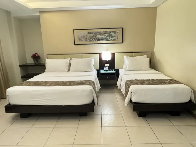 غرفة ديلوكس بثلاثة أسرّة، Circle Inn - Iloilo City Center 1/10