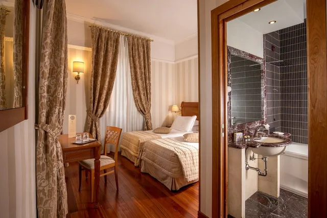 غرفة بسريرين منفصلين، Albergo Ottocento 5/5