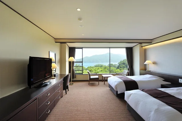 غرفة غربية بسريرين منفصلين بإطلالة على البحر، Jodogahama Park Hotel 1/1