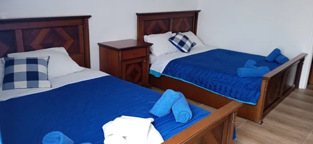 Superior, Studio, 1 Single and 2 Queen Beds, Pool View, Balcony، Kapetanios Studios 4/4