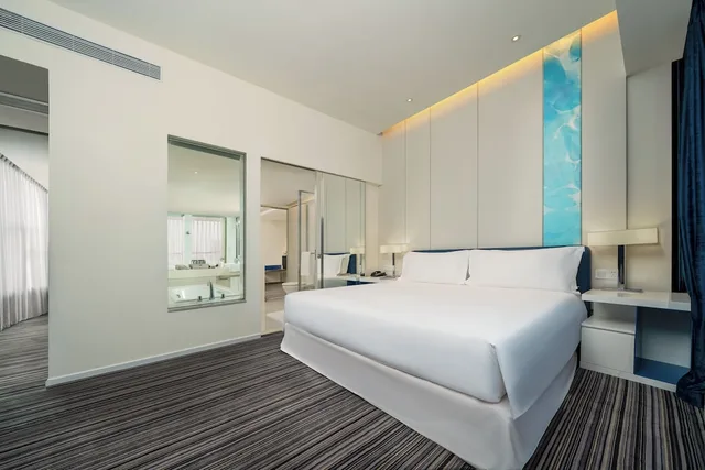 جناح ديلوكس بسرير كينج مع دخول صالة النادي، Grand Mercure Shanghai Century Park Hotel 1/2