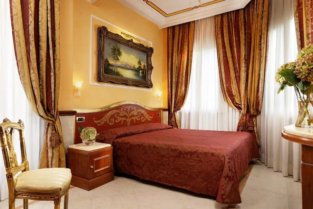 غرفة رباعية بسرير مزدوج وسريرين منفصلين، Clarion Collection Hotel Principessa Isabella 3/5