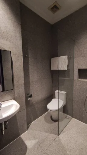 غرفة ديلوكس بسرير مزدوج أو سريرين منفصلين، The Grand Palace Hotel Malang 3/3