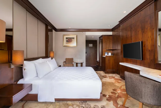 غرفة ديلوكس بسرير كوين، SWISS-BELHOTEL BORNEO BANJARMASIN 1/4