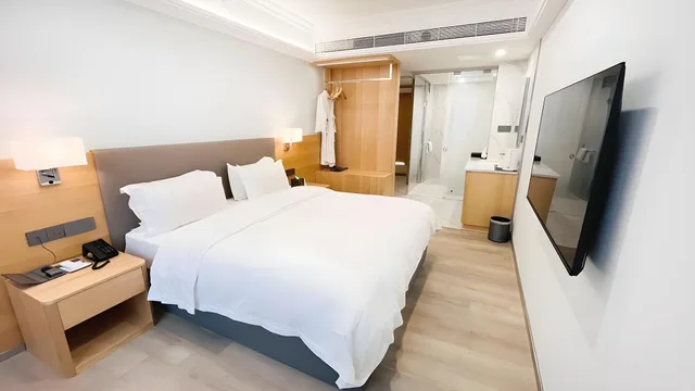 غرفة ديلوكس بسرير كوين، La Perle International Hotel 2/2