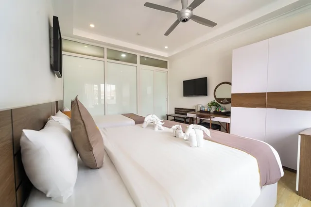 غرفة سوبيريور ثلاثية بسرير مزدوج وسرير فردي، Lotus Garden Resort 5/7