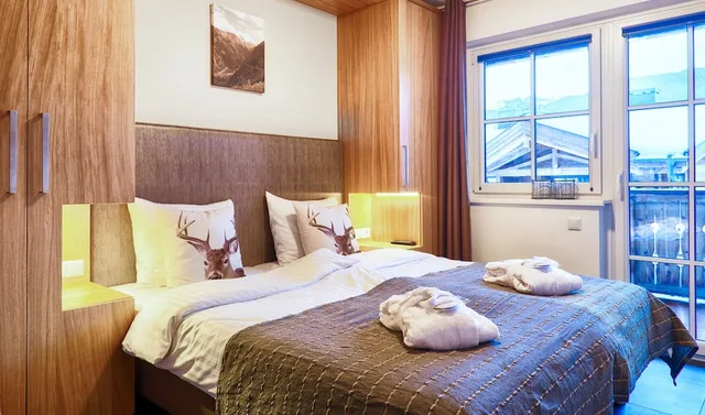 شقة بسريرين مزدوجين وسرير بطابقين بشرفة بغرفتي نوم، Avenida Mountain Resort Kaprun 1/5