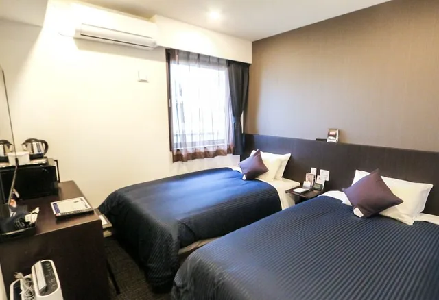 غرفة بزنس بسريرين منفصلين، Hotel Livemax Sendai Hirose-dori 3/5