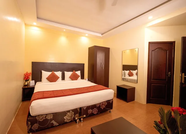 غرفة بسرير كوين في الطابق الأرضي، TGI STAR Holidays Yercaud 2/3
