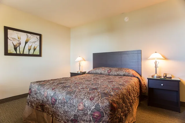 غرفة كومفورت بسرير كوين، Motel Et Appartements Du Fleuve 1/3