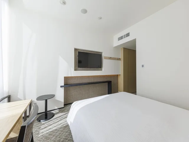 غرفة بسرير كينج وسرير كوين، JR Kyushu Hotel Blossom Shinjuku 5/5