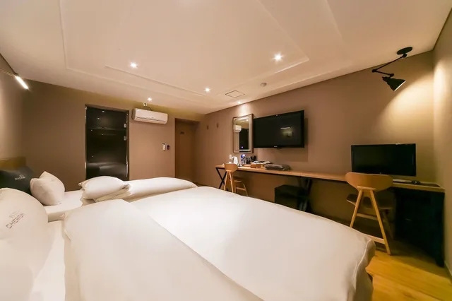غرفة ديلوكس بسريرين منفصلين، Cherish Hotel 1/4