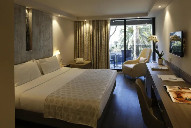 غرفة ديلوكس بسرير مزدوج بشرفة، Palmon Bay Hotel and Spa 1/1