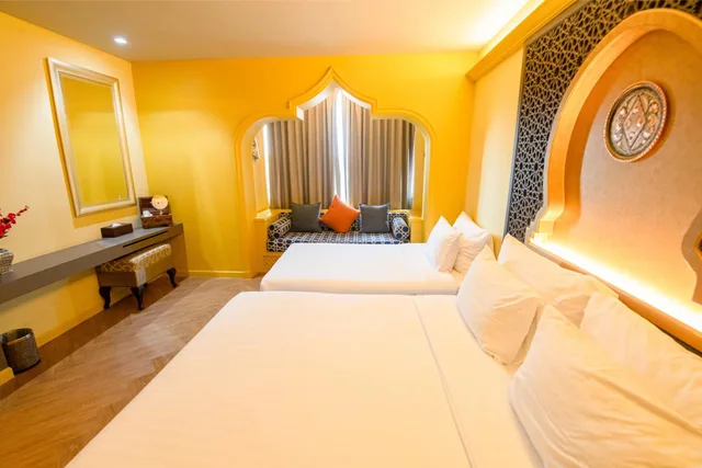 غرفة ديلوكس ثلاثية بسرير مزدوج وسرير فردي، Amman Unique Hotel 1/2