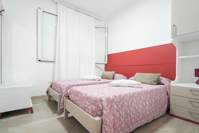 جناح ديلوكس بسرير كوين وسريرين فرديين، Residence La Pineta - Campsite 5/10