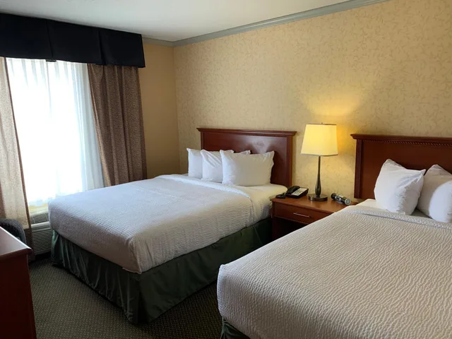 جناح بسرير كوين، Merit Hotel And Suites 1/10