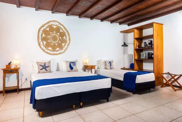 غرفة سوبيريور ثلاثية بسرير مزدوج وسرير فردي في الملحق، Ilha Branca Exclusive Hotel 5/9
