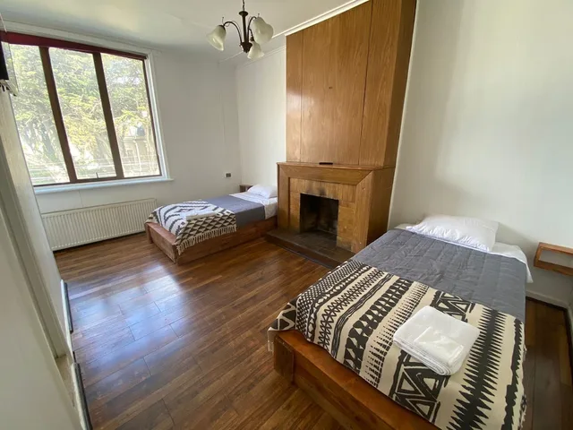 غرفة ديلوكس بسريرين منفصلين، Hostal Ochen Punta Arenas 1/1