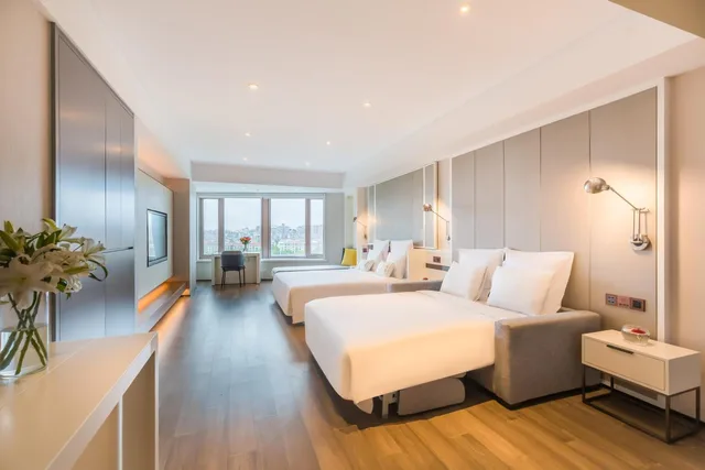 غرفة عائلية ثلاثية بسرير كينج وسرير فردي، Beijing Pudi Hotel 3/3