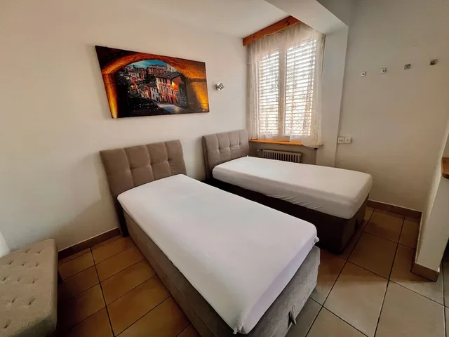 غرفة كومفورت رباعية بسرير مزدوج وسريرين منفصلين، Hotel San Carlo 4/10
