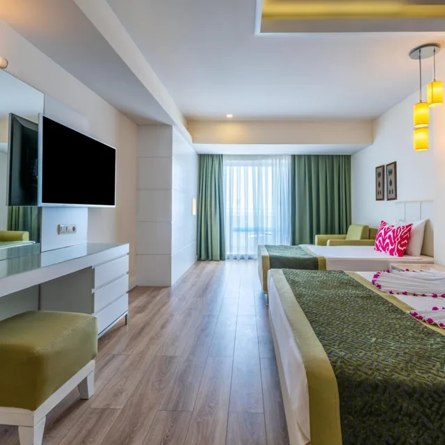 غرفة ثلاثية بسرير فردي بإطلالة على البحر، Orange County Alanya 3/4