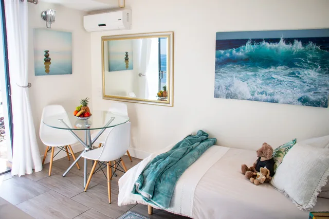 جناح ديلوكس بسرير كوين بإطلالة على البحر مع أريكة، 185 On Beach Boutique Suites And Apartments 2/2