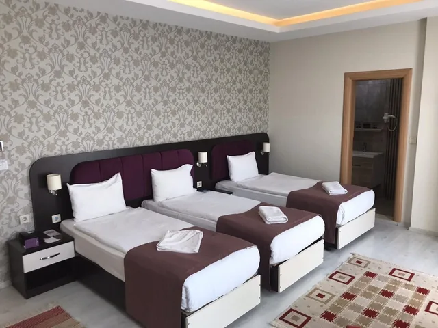 غرفة ديلوكس ثلاثية، Niconya Port Suite Hotel 1/10