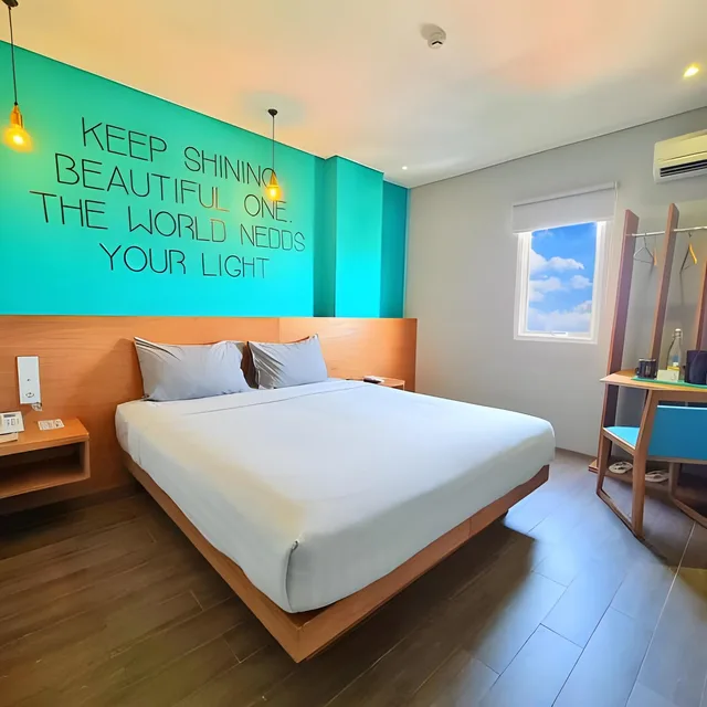 غرفة عائلية بسرير كوين وسرير فردي، Radja Art And Boutique Hotel Semarang 2/4