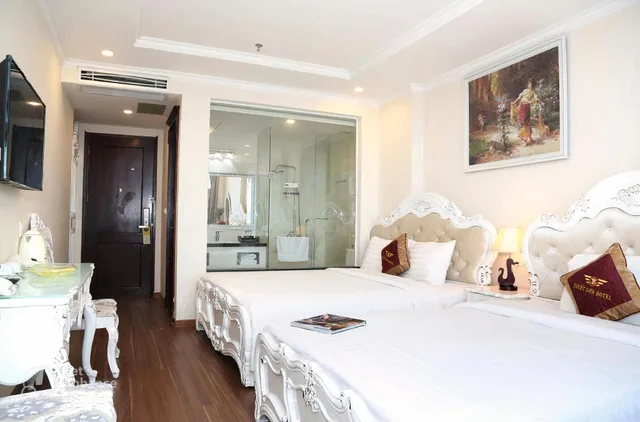غرفة ديلوكس بسريرين منفصلين بإطلالة على البحر، Tuyet Son Hotel 1/3