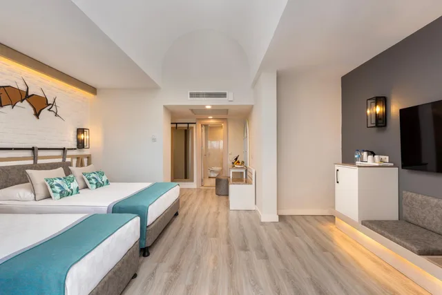 غرفة ديلوكس ثلاثية بسرير مزدوج وسرير فردي، Limak Arcadia Sport Resort 3/4