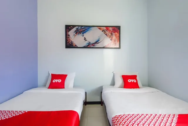 غرفة قياسية بسريرين منفصلين، OYO 3387 Nakula Homestay Syariah 1/3