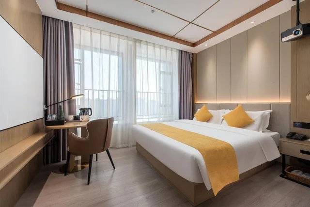 Smart, Feature, Deluxe, Queen Bed، Poltton International Apartment (Guangzhou Panyu Government Affairs Center) 2/2