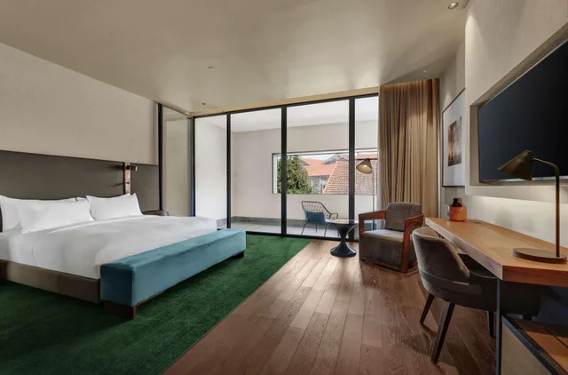 غرفة ديلوكس بسرير مزدوج بشرفة، Hilton Porto Gaia 1/10