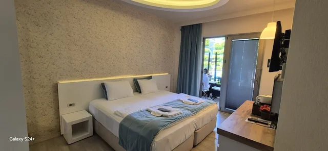 غرفة ديلوكس بسرير كوين بإطلالة على المسبح، The D Hotel Cesme Spa & Resort 7/8
